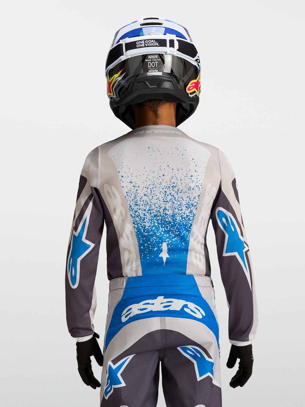 Alpinestars Camisola Fluid Drag Jovem 2027, camisola de motocross para jovens, cinzenta e azul, vista traseira, construção em polifabric respirável com gráficos dinâmicos.