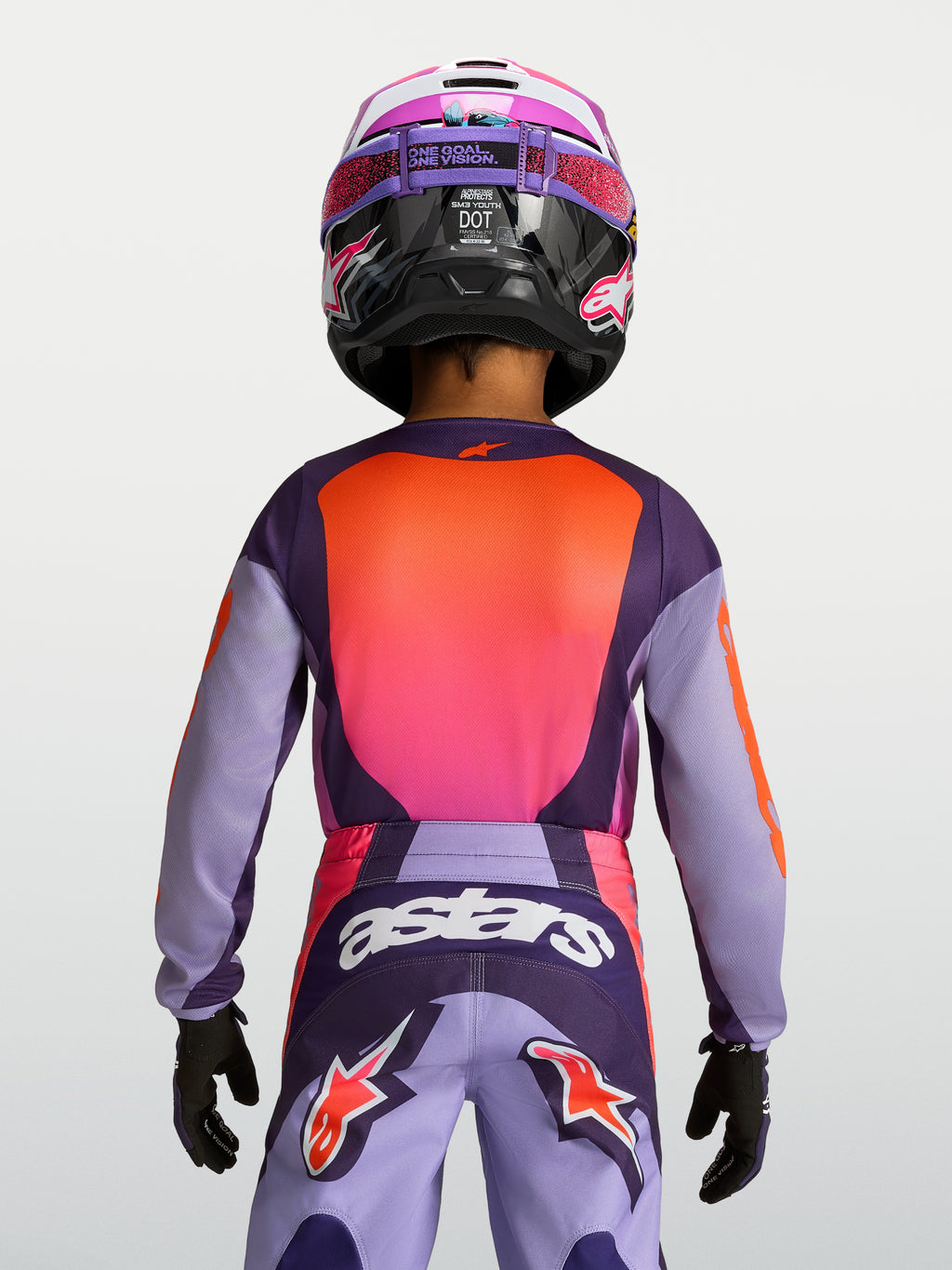 Camisola Fluid Hunt Jovem, equipamento de motocross para juventude, roxa e rosa, vista traseira com ajuste ergonómico.
