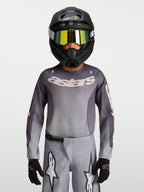 Camisola Alpinestars Fluid Amber Jovem, camisola de motocross respirável cinzenta e areia, para condução todo-o-terreno.
