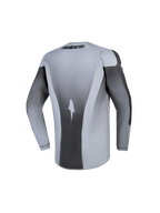 Alpinestars Camisola Fluid Amber Jovem 2027, camisola de motocross cinzenta e preta, vista traseira, tecido respirável.