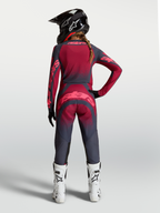 Alpinestars Stella Techstar Swan, conjunto e calças de motocross para mulher, cinzento e vermelho, vista traseira.