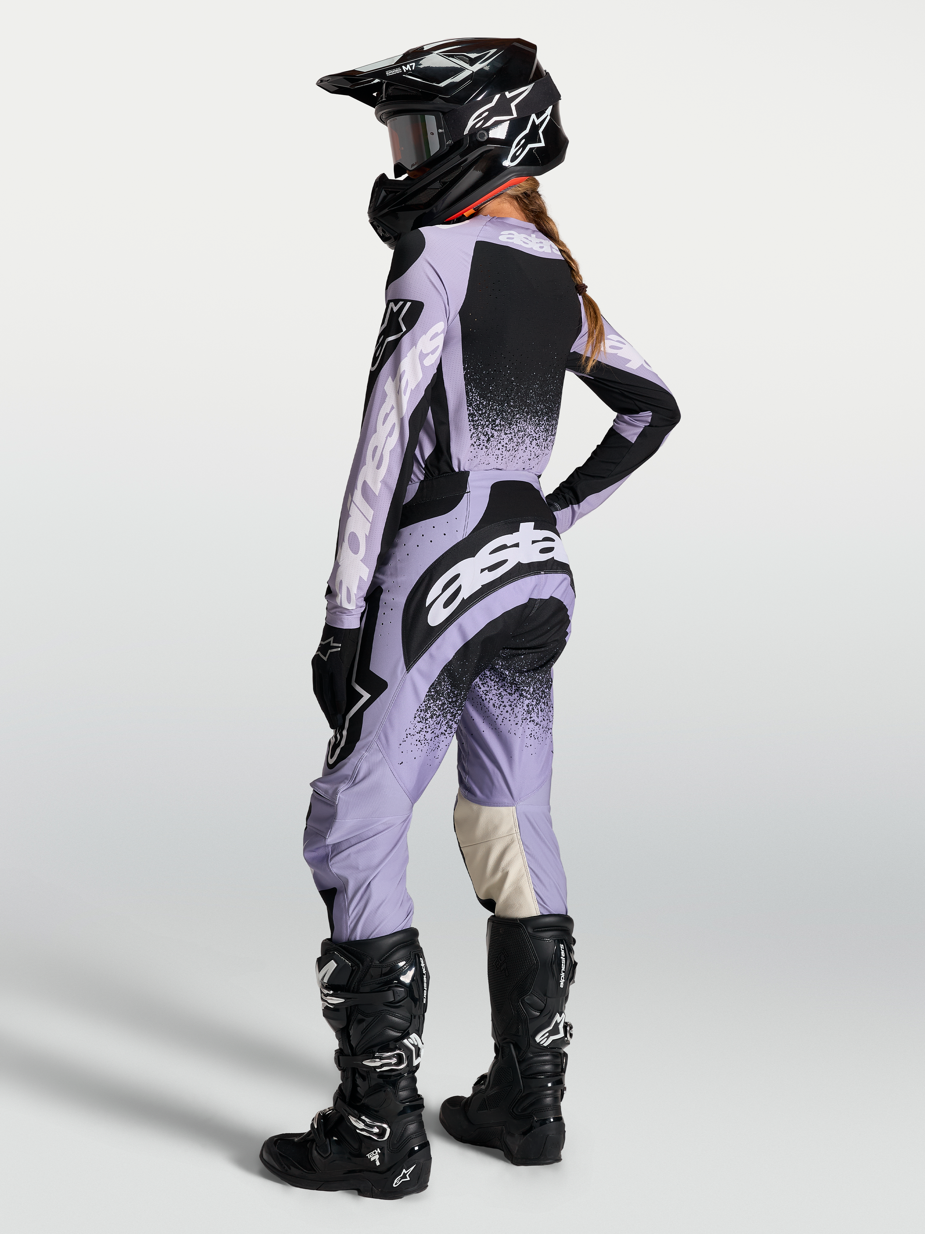 Alpinestars Stella Techstar Swan, calças de motocross para mulher, roxo claro e preto, com ajuste de corrida ergonómico.