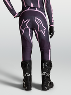 Alpinestars Calças Stella Fluid Apex V2, calças de motocross para mulher, cinzentas e rosa, com botas pretas Alpinestars Tech.
