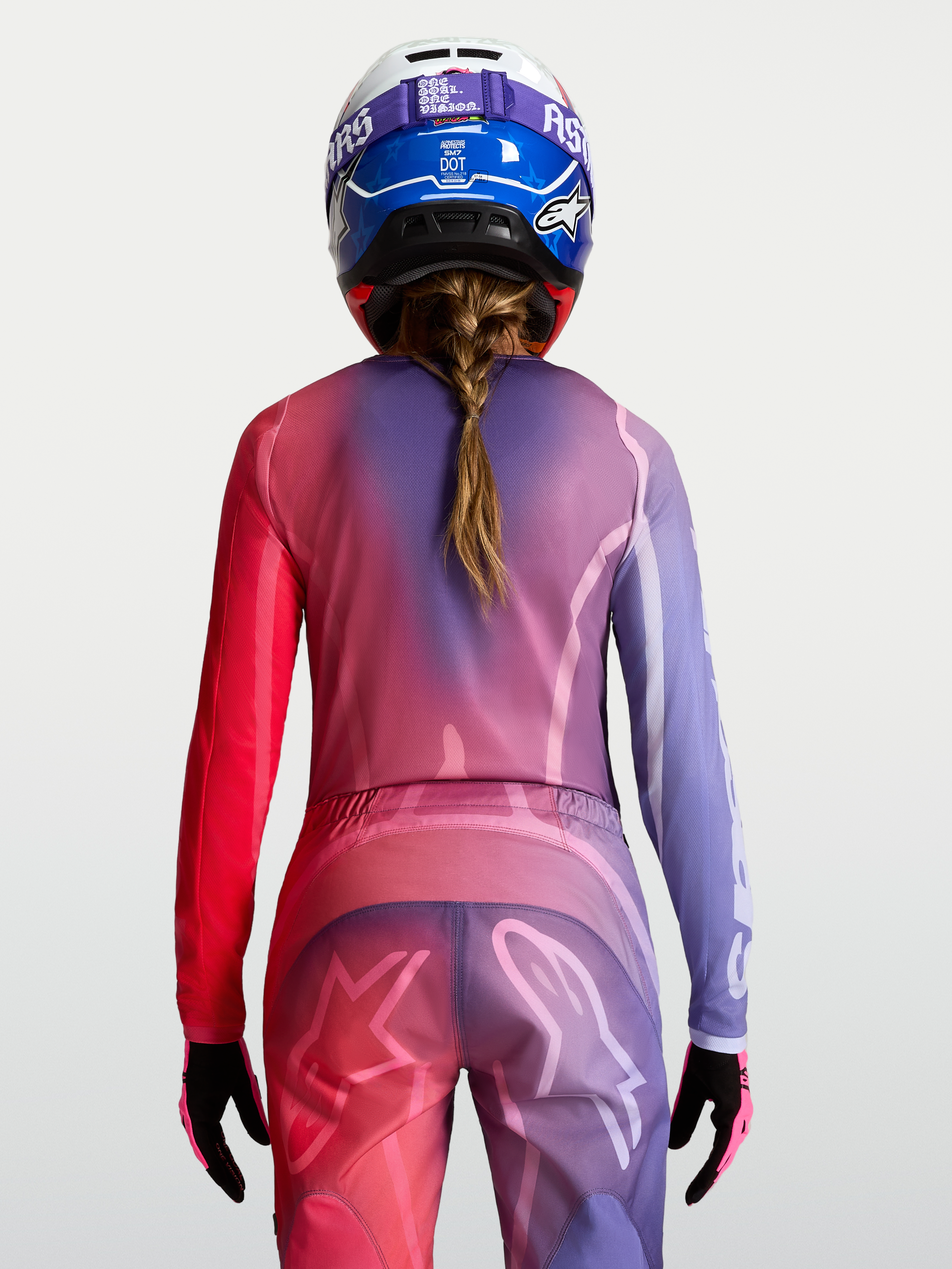 Alpinestars Stella Fluid Kepler, camisola de motocross para mulher, roxa e vermelha, em polifabric, vista traseira.
