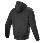 Alpinestars FQ20 Chrome Ignition Monster Hoodie, casaco de motociclismo com capuz preto, vista traseira, logótipo Alpinestars branco no ombro, marca Monster Energy na manga, design urbano casual com construção têxtil protetora