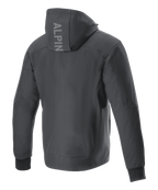 Alpinestars Radium Tech Hoodie, Motorcycle Jacket, Black, back view showing vertical ALPIN logo on the hood, windproof 3L tech shell construction, ribbed stretch cuffs, urban contemporary style