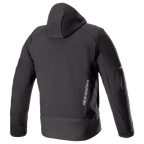 Alpinestars Neo Waterproof Hoodie, technical urban motorcycle jacket, Black, rear view showing detachable hood, vertical silver Alpinestars branding on the lower back, and reflective accents on the sleeves.