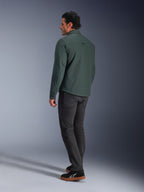 Alpinestars Bryon Water Resistant Overshirt, Dark Emerald green, back view of an urban motorcycle jacket, worn with dark trousers and black sneakers, showcasing a modern workwear-inspired design.
