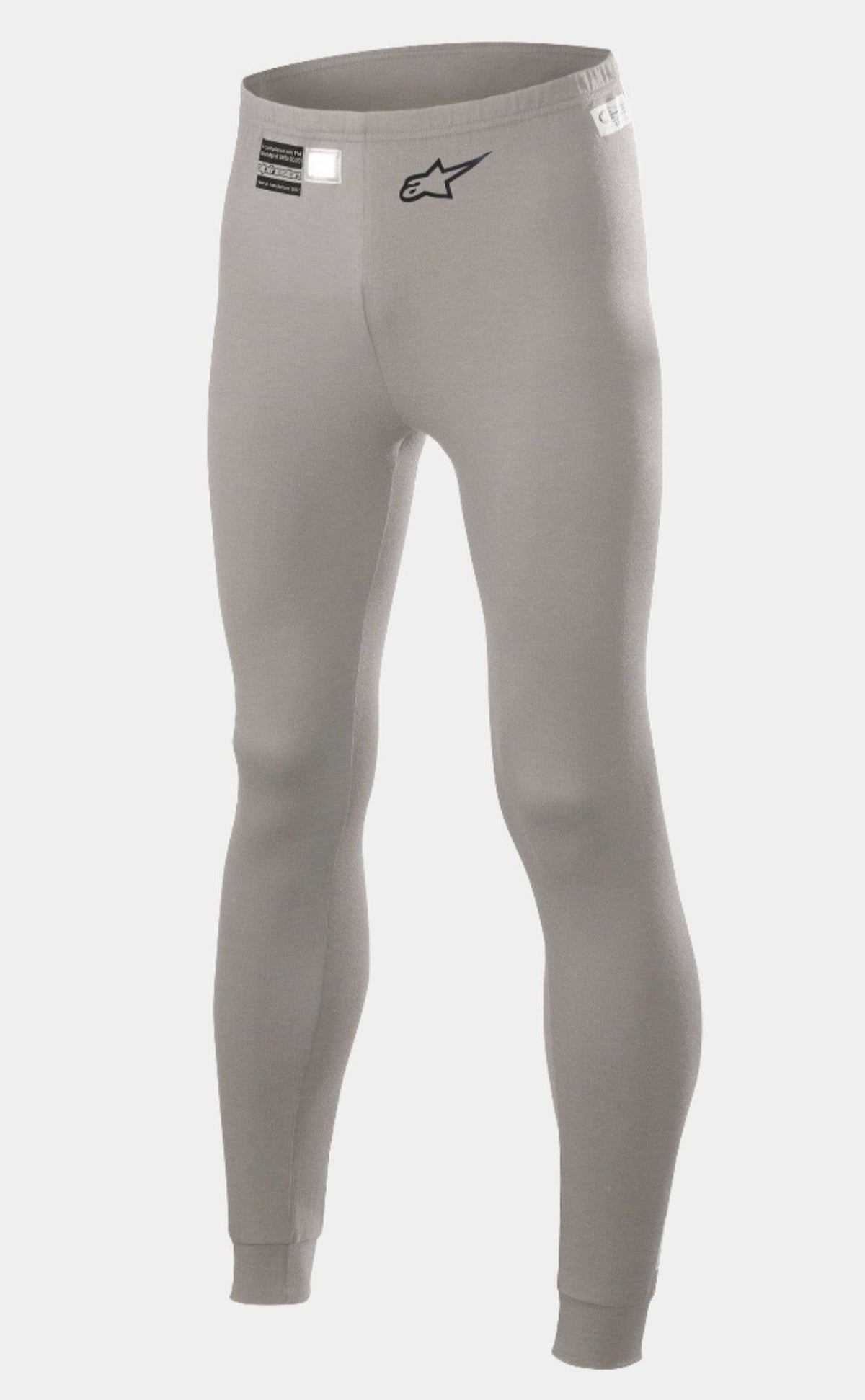 Alpinestars Race V2 Bottom FIA, calças de camada base para automobilismo, cinza médio, com logótipo de estrela preto na perna e etiqueta de homologação FIA na cintura, tecido leve resistente ao fogo com punhos nos tornozelos