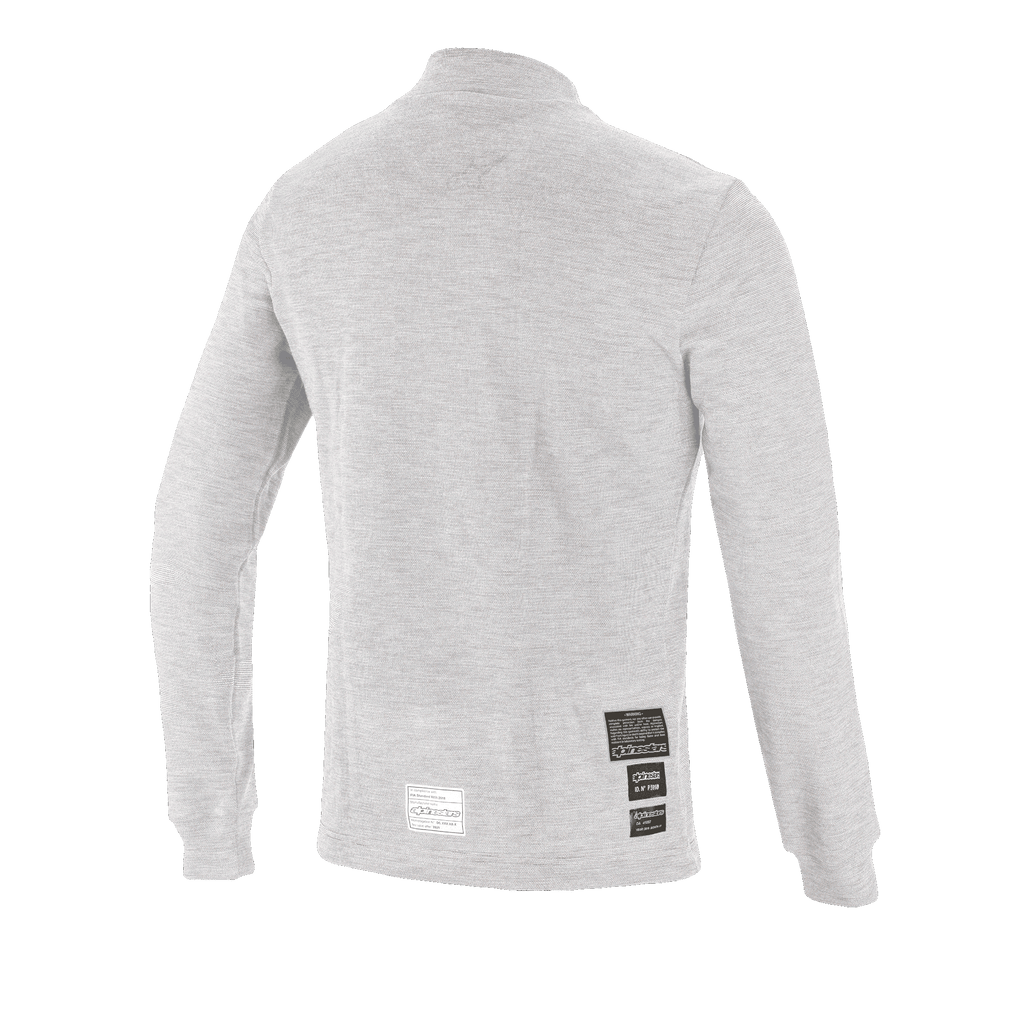 Top de Manga Comprida Alpinestars Race V3, camada base de automobilismo, branco, vista traseira mostrando etiquetas de homologação FIA 8856-2018 na parte inferior das costas, material de textura macia resistente ao fogo para proteção em desportos motorizados