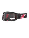 Óculos Alpinestars Supertech Corp, armação preta e vermelha com lente transparente, correia ajustável preta com um logótipo de estrela grande em vermelho e branco, óculos de motocross profissionais concebidos para corridas off-road