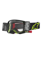 Alpinestars Supertech Firma Roll Off, óculos de motocross pretos e amarelo fluo com sistema roll-off e lente transparente.
