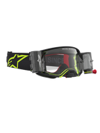 Alpinestars Supertech Firma Roll Off, óculos de motocross pretos e amarelos fluo, sistema roll-off e lente transparente.