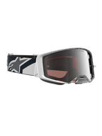 Óculos Alpinestars Supertech Hiten de motocross, brancos e pretos, com lente prateada espelhada e correia com logótipo de estrela