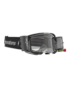 Óculos Alpinestars Vision 8 Âmbar Roll Off, óculos de motocross pretos e prateados com lente transparente e sistema roll-off.