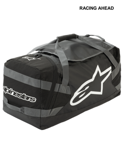 Alpinestars Goanna Bag, saco de motocross, preto e cinzento antracite com logótipos brancos, inclui logótipo lateral de estrela de grandes dimensões e marca nominativa, base em lona durável, alças de transporte reforçadas, grande capacidade para armazenamento de equipamento de competição todo-o-terreno