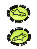 Deslizadores de joelho Alpinestars GP Plus, deslizadores de corrida para motociclismo, amarelo flúor e preto, par esquerdo e direito com logótipo de estrela preta em superfície amarela brilhante, bordas pretas texturadas com marca "alpinestars" e "ONE GOAL ONE VISION", concebidos para resistência à abrasão em pista
