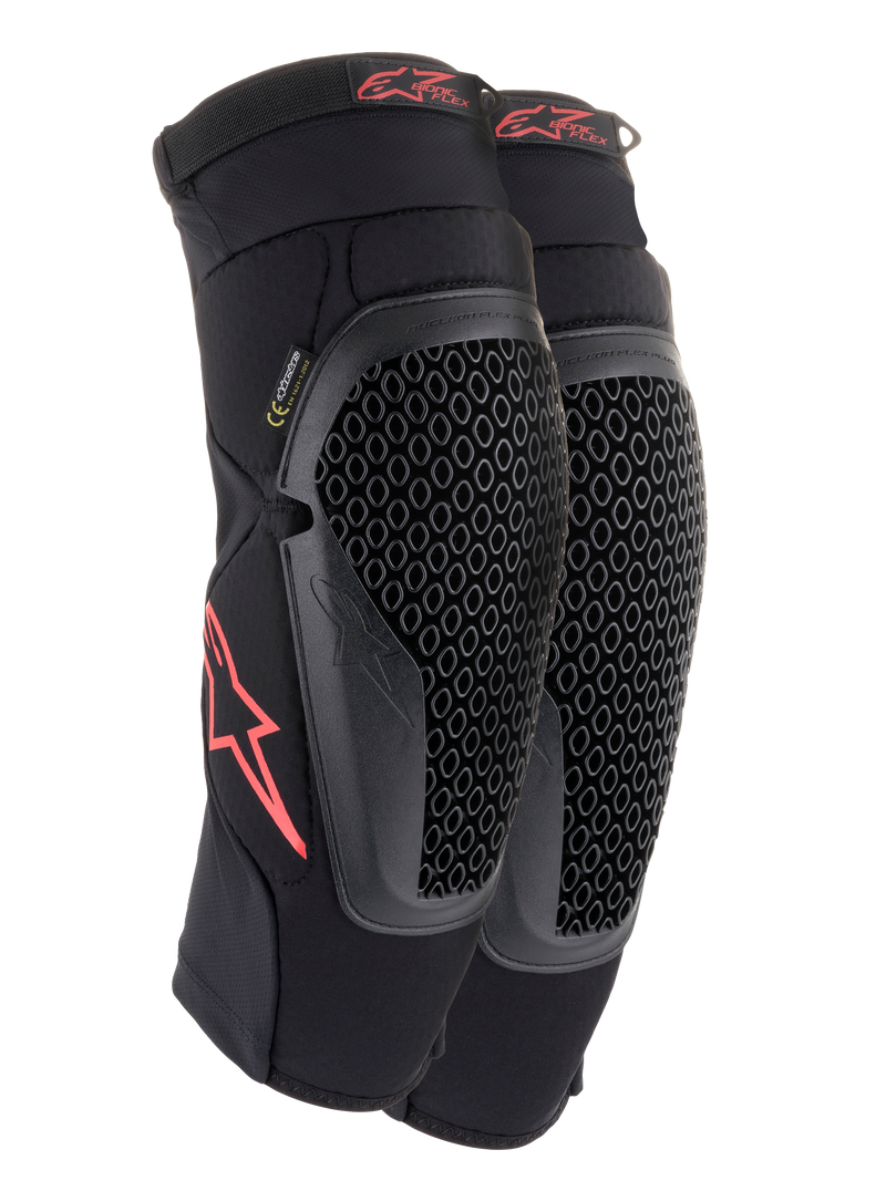 Alpinestars Bionic Flex Knee Protectors, preto e vermelho, par de joelheiras de motocross com escudos de Tecnologia Nucleon Flex perfurados, logótipos Astars vermelhos e tiras elásticas numa manga de malha preta respirável