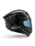 Alpinestars Supertech R10 Solid Helmet, capacete de corrida em fibra de carbono, preto mate e brilhante, perfil lateral, viseira com tonalidade azul, design aerodinâmico com winglets, logótipo branco, proteção de alto desempenho de nível MotoGP