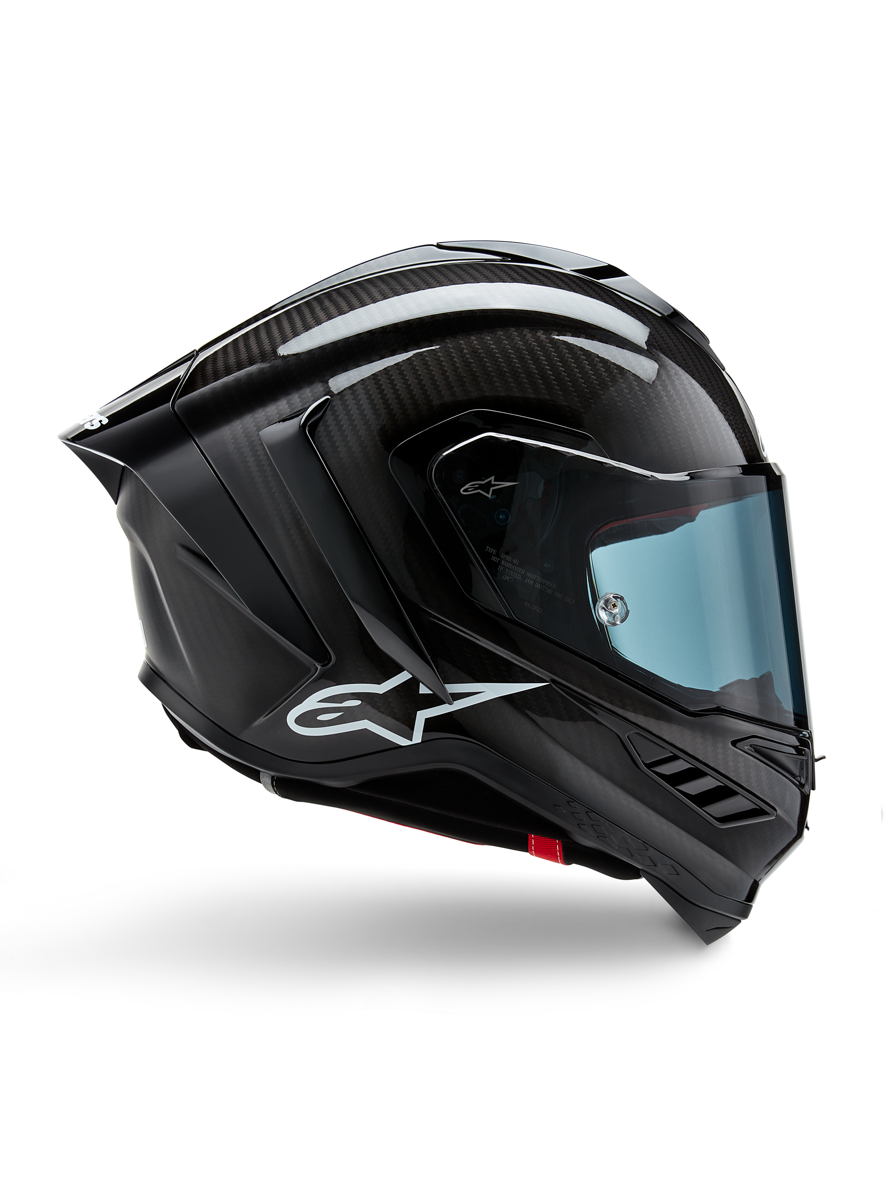Alpinestars Supertech R10 Solid Helmet, capacete de corrida em fibra de carbono, preto mate e brilhante, perfil lateral, viseira com tonalidade azul, design aerodinâmico com winglets, logótipo branco, proteção de alto desempenho de nível MotoGP