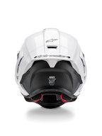 Alpinestars Supertech R10 Solid Helmet, Rear view, White Glossy top with Black Matte lower section, aerodynamic spoiler with black Alpinestars logo, visible carbon fiber texture, and safety certification decals