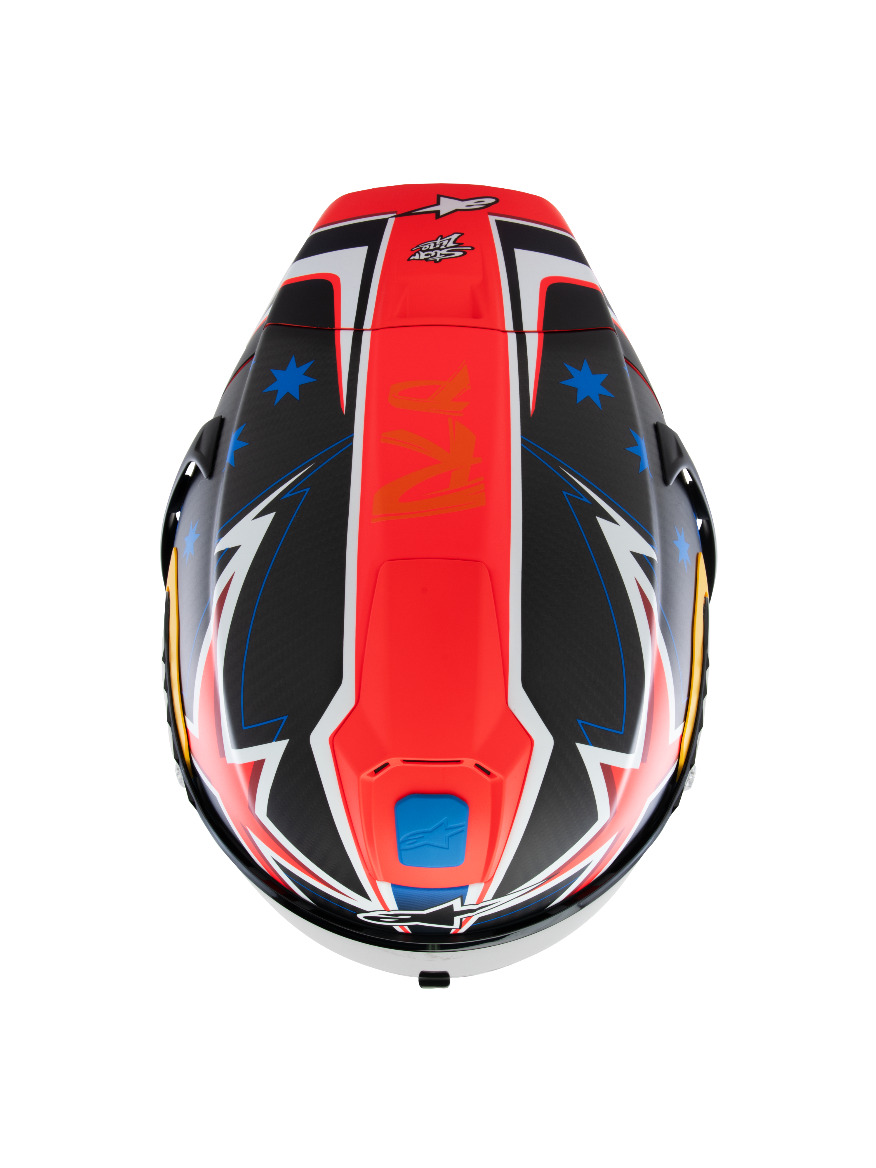 Capacete Alpinestars Supertech R10 Miller Limited Edition, vista superior, gráfico Carbon Red Matt com uma risca central vermelha, estrelas azuis em secções de fibra de carbono preta, detalhes brancos e azuis em estilo relâmpago, design aerodinâmico de corrida para desempenho em pista.