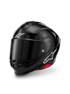 Alpinestars S-R7 Solid Helmet, capacete de motociclismo integral, preto brilhante, casco em compósito de carbono, logótipos de estrela brancos na parte frontal e lateral, design aerodinâmico com spoiler integrado e aberturas de ventilação