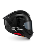 Capacete Alpinestars S-R7 Solid, capacete integral de motociclismo, preto brilhante, vista de perfil com logótipo A-star branco, casco aerodinâmico com spoiler integrado e detalhes vermelhos na base, concebido para competição e performance desportiva.