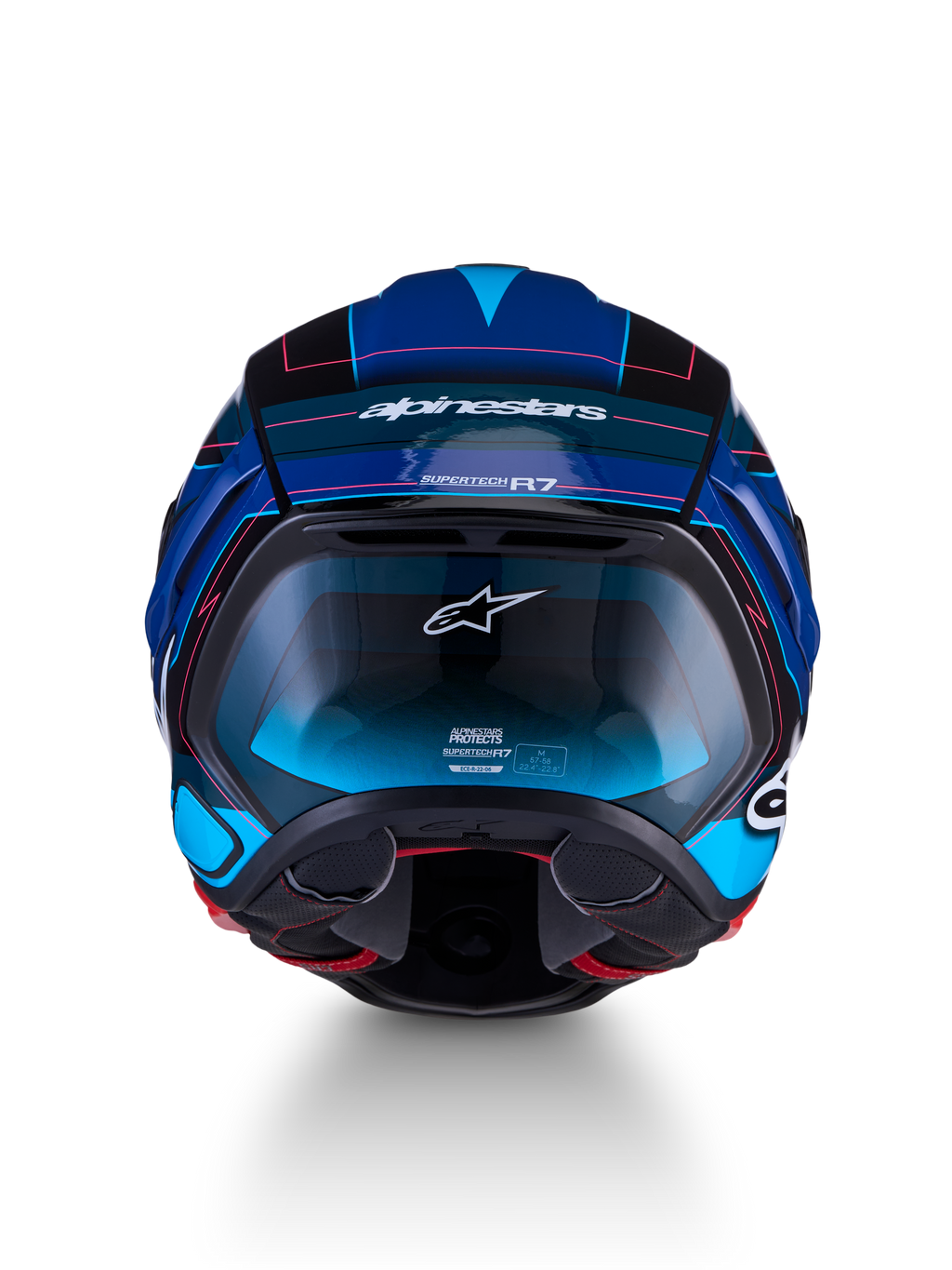 Alpinestars S-R7 Kinetis ECE 22.06, capacete de moto para estrada, vista frontal em preto, azul, rosa fluo e branco brilhante com construção em carbono e design aerodinâmico