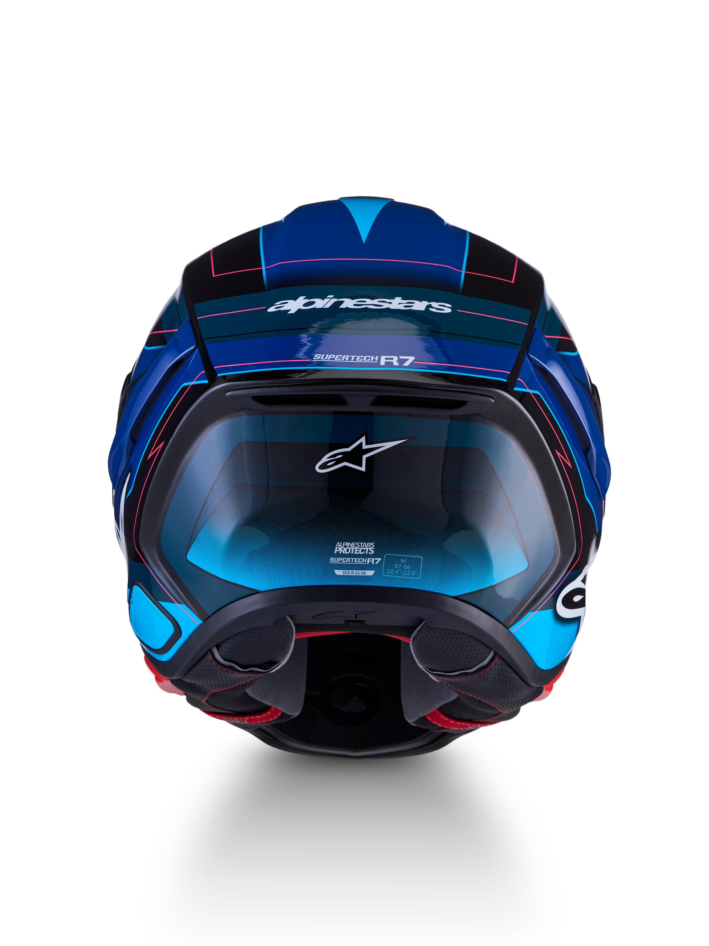 Alpinestars S-R7 Kinetis ECE 22.06, capacete de moto para estrada, vista frontal em preto, azul, rosa fluo e branco brilhante com construção em carbono e design aerodinâmico