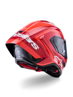 Capacete Alpinestars Supertech R10 Arius, vermelho brilhante com logótipos brancos, vista traseira de três quartos mostrando o spoiler aerodinâmico, construção do casco em fibra de carbono e perfil de corrida elegante com viseira escura