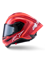 Capacete Alpinestars Supertech R10 Arius, capacete de corrida integral, vermelho brilhante com grafismos de logótipo brancos, vista de perfil lateral destacando o spoiler aerodinâmico e a viseira transparente, calota em composto de fibra de carbono para motociclismo profissional