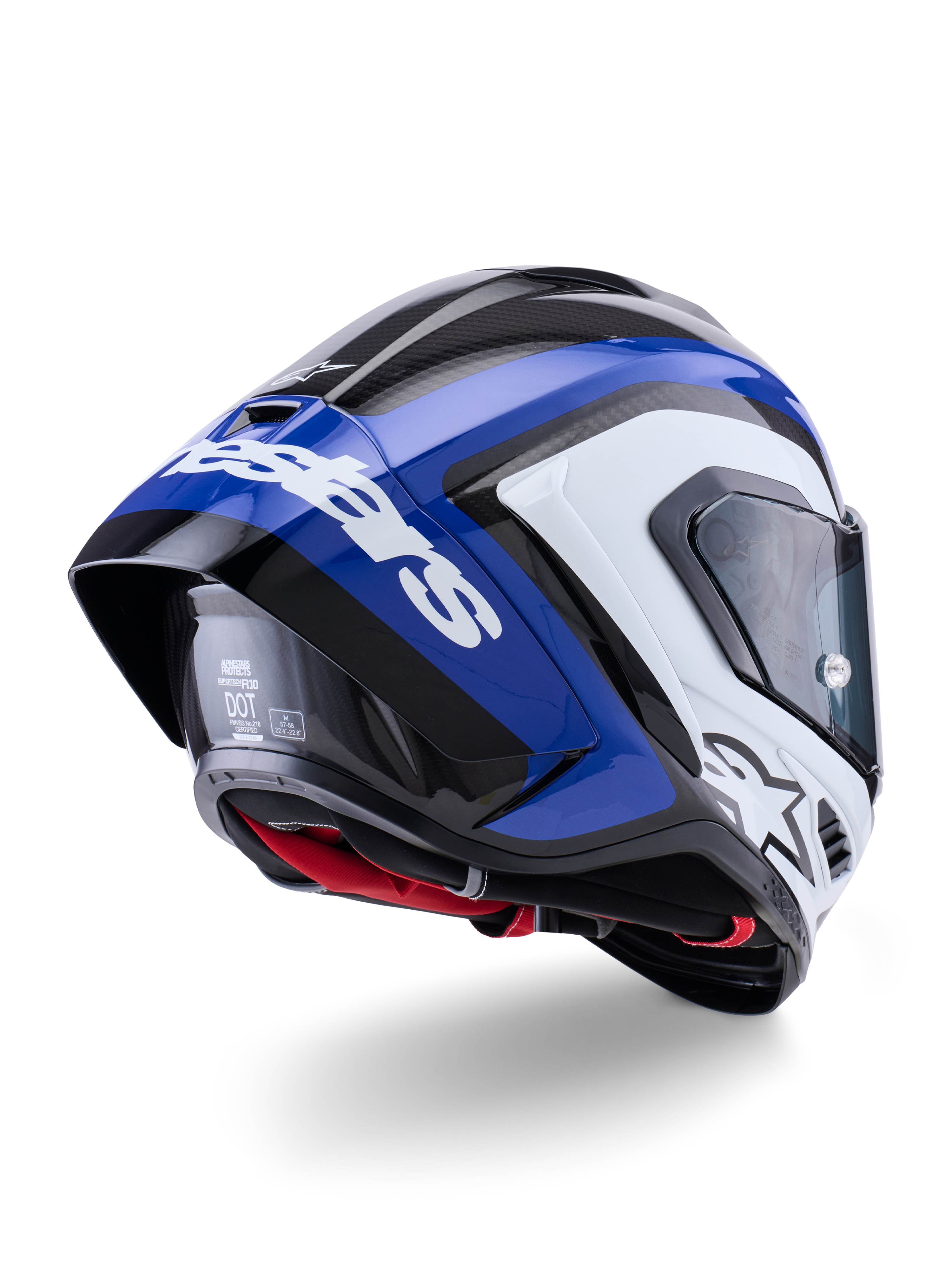 Capacete Alpinestars Supertech R10 Arius, capacete integral de corrida, preto, branco e azul brilhante, vista traseira de três quartos mostrando o spoiler aerodinâmico, textura de fibra de carbono visível e logótipo Alpinestars em branco