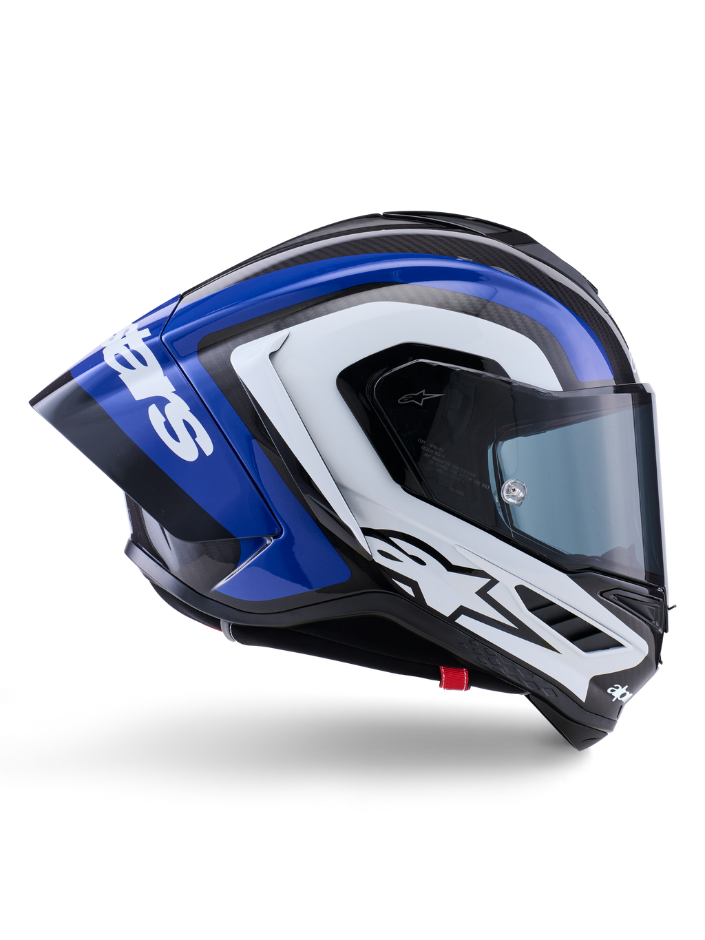Capacete Alpinestars Supertech R10 Arius, capacete de corrida integral, acabamento brilhante em preto, branco e azul, vista lateral aerodinâmica mostrando o casco em fibra de carbono e spoiler traseiro grande com o logótipo da Alpinestars, equipamento de proteção profissional para motociclismo