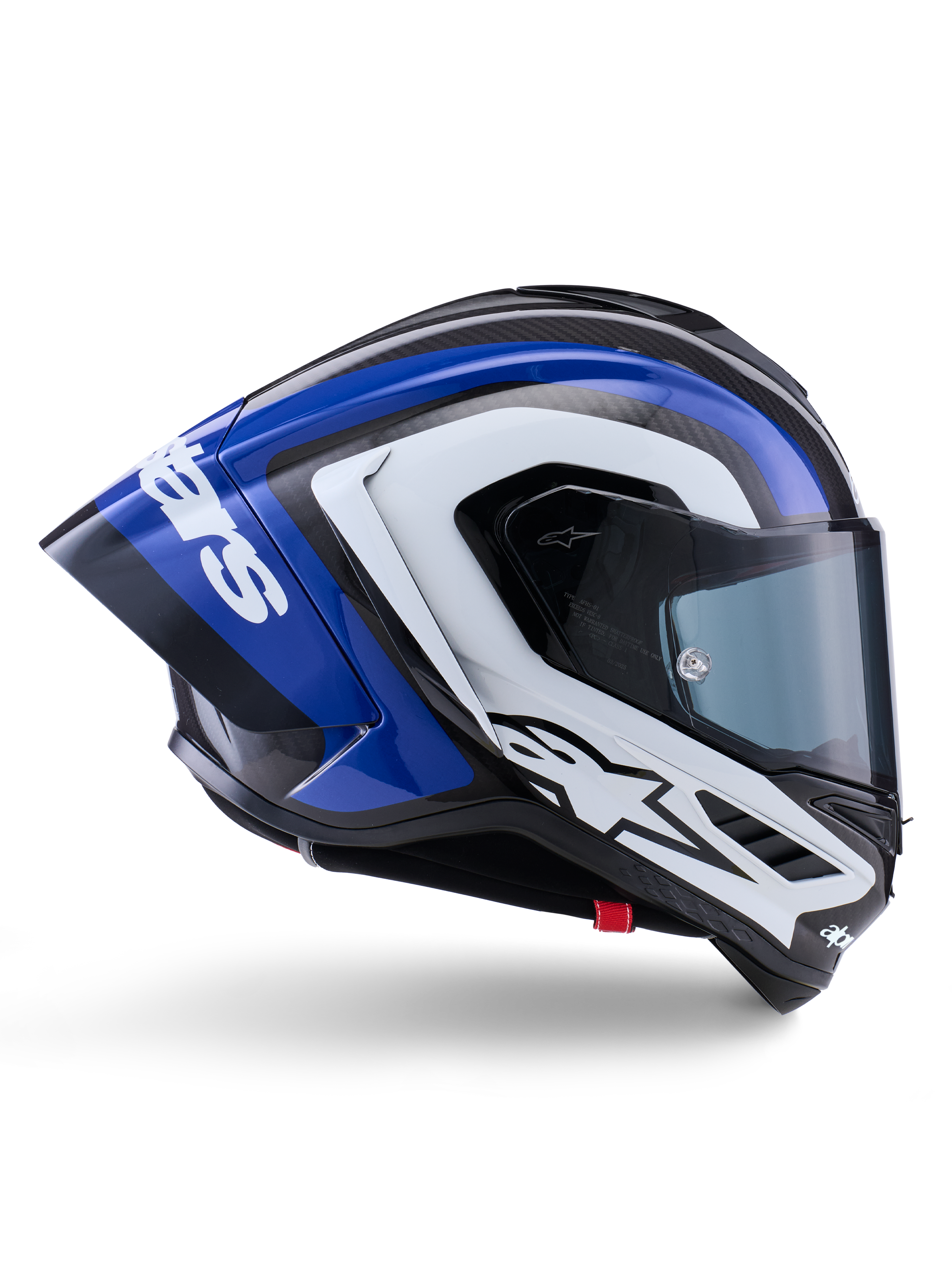 Capacete Alpinestars Supertech R10 Arius, capacete de corrida integral, acabamento brilhante em preto, branco e azul, vista lateral aerodinâmica mostrando o casco em fibra de carbono e spoiler traseiro grande com o logótipo da Alpinestars, equipamento de proteção profissional para motociclismo