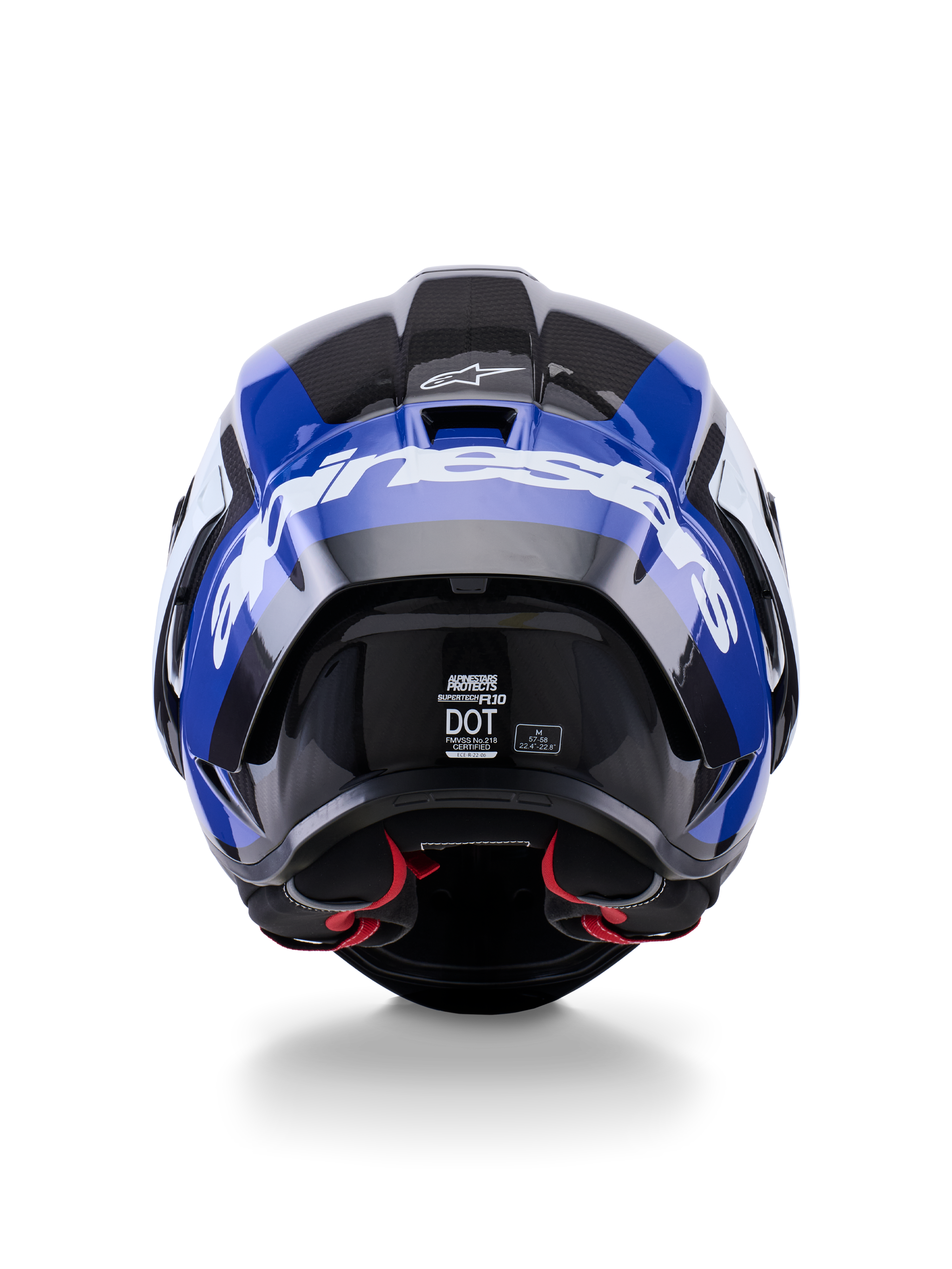 Capacete Alpinestars Supertech R10 Arius, vista traseira, preto, branco e azul brilhante, construção em fibra de carbono com logótipo branco em destaque, forma aerodinâmica, etiqueta de certificação DOT, acolchoamento interior vermelho