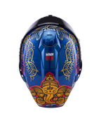 Alpinestars Supertech R10 Martinator Thai Helmet, glossy blue carbon shell with gold elephant graphic and intricate rear patterns.