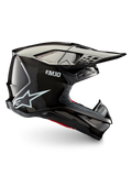 Alpinestars Supertech M10 Solid motocross helmet, side profile in black glossy carbon with carbon shell, peak visor and ventilation ports for off-road riding