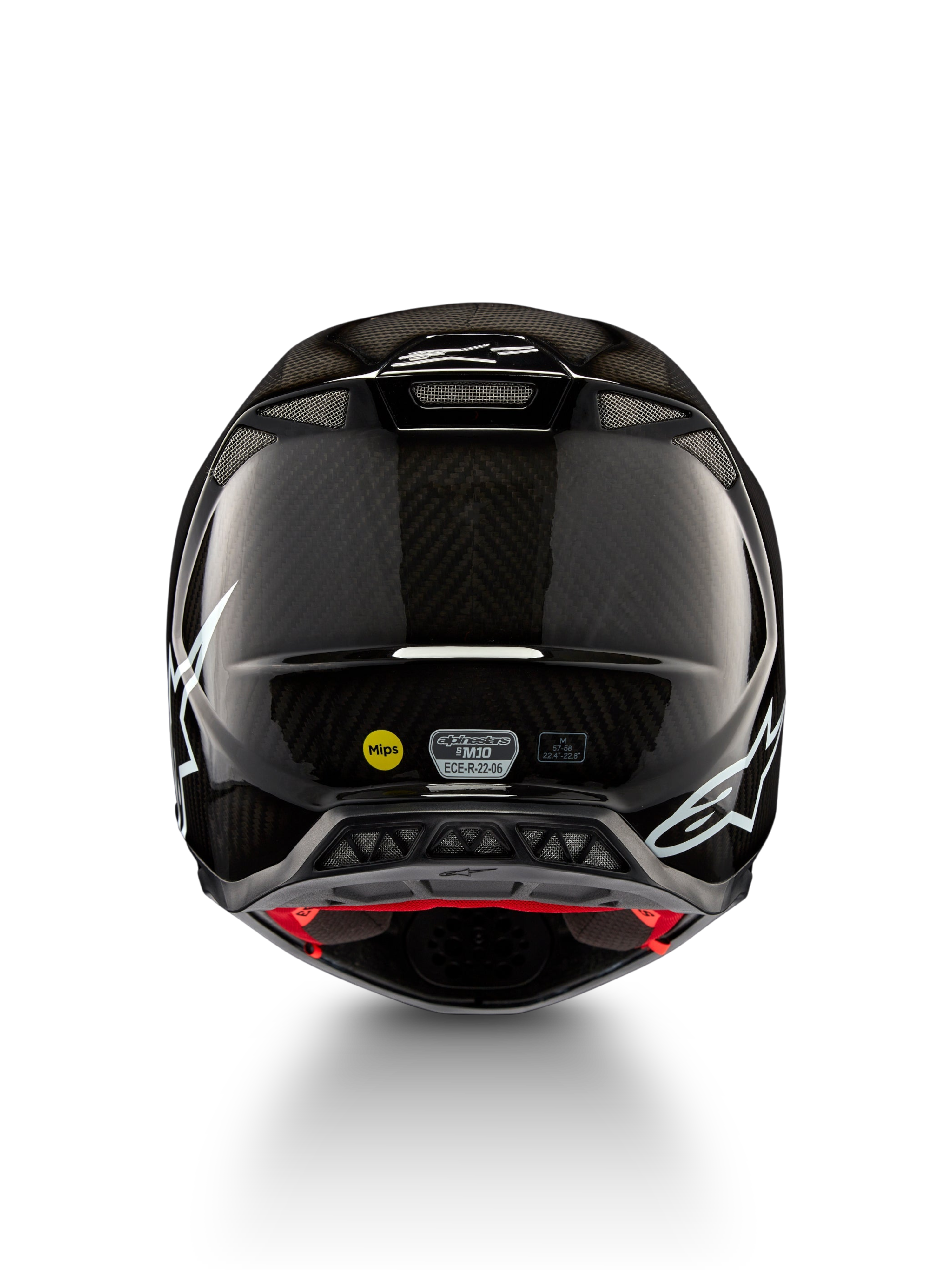 Alpinestars Supertech M10 Solid Helmet ECE 22.06, black glossy carbon motocross helmet, rear view with white graphics, ventilation ports, MIPS and ECE-R 22.06 certification labels