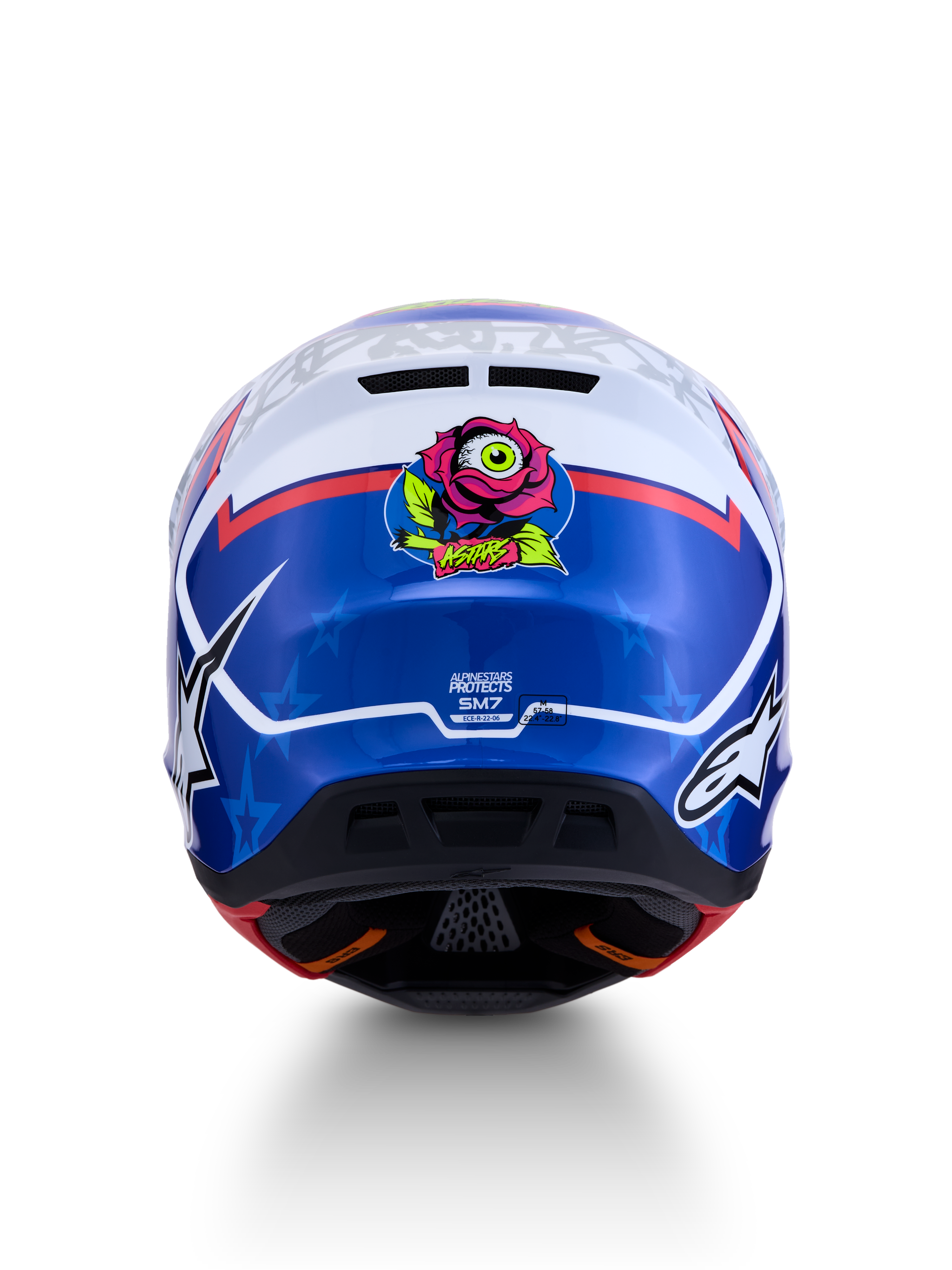 Alpinestars S-M7 Blaster ECE06, capacete de motocross azul e branco, vista traseira com gráfico de rosa e certificação ECE.