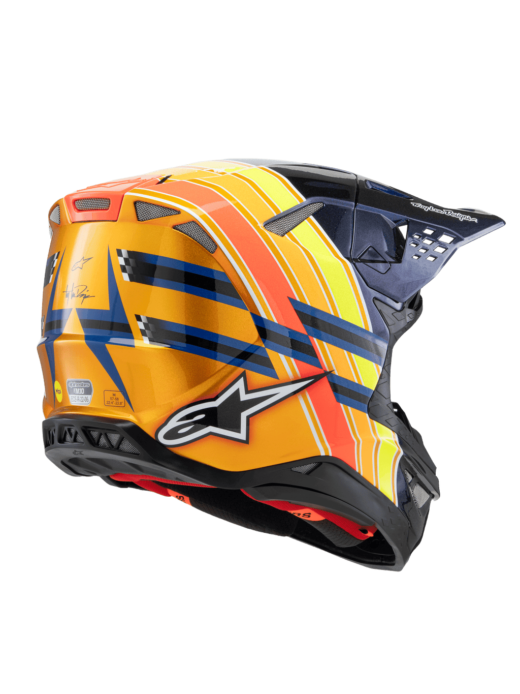 Capacete Alpinestars Supertech M10 Edição TLD 25, capacete de motocross, azul escuro, laranja e amarelo fluorescente com vermelho, vista traseira em três quartos mostrando acabamento brilhante, logótipo Alpinestars em destaque, marca Troy Lee Designs e aberturas de ventilação integradas.