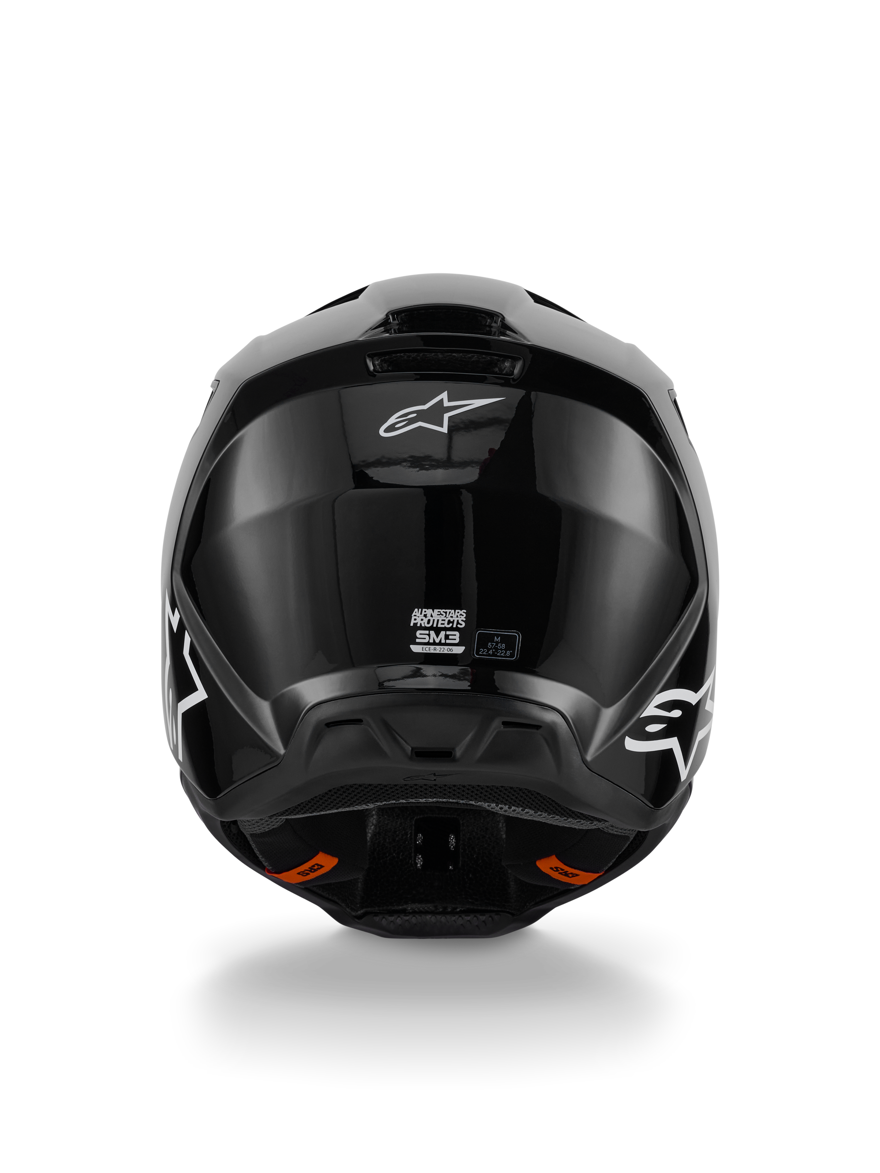 Alpinestars S-M3 Solid Helmet, Motocross Helmet, Glossy Black finish, rear view featuring white Alpinestars logo, ECE 22.06 certification label, and aerodynamic shell with exhaust ports