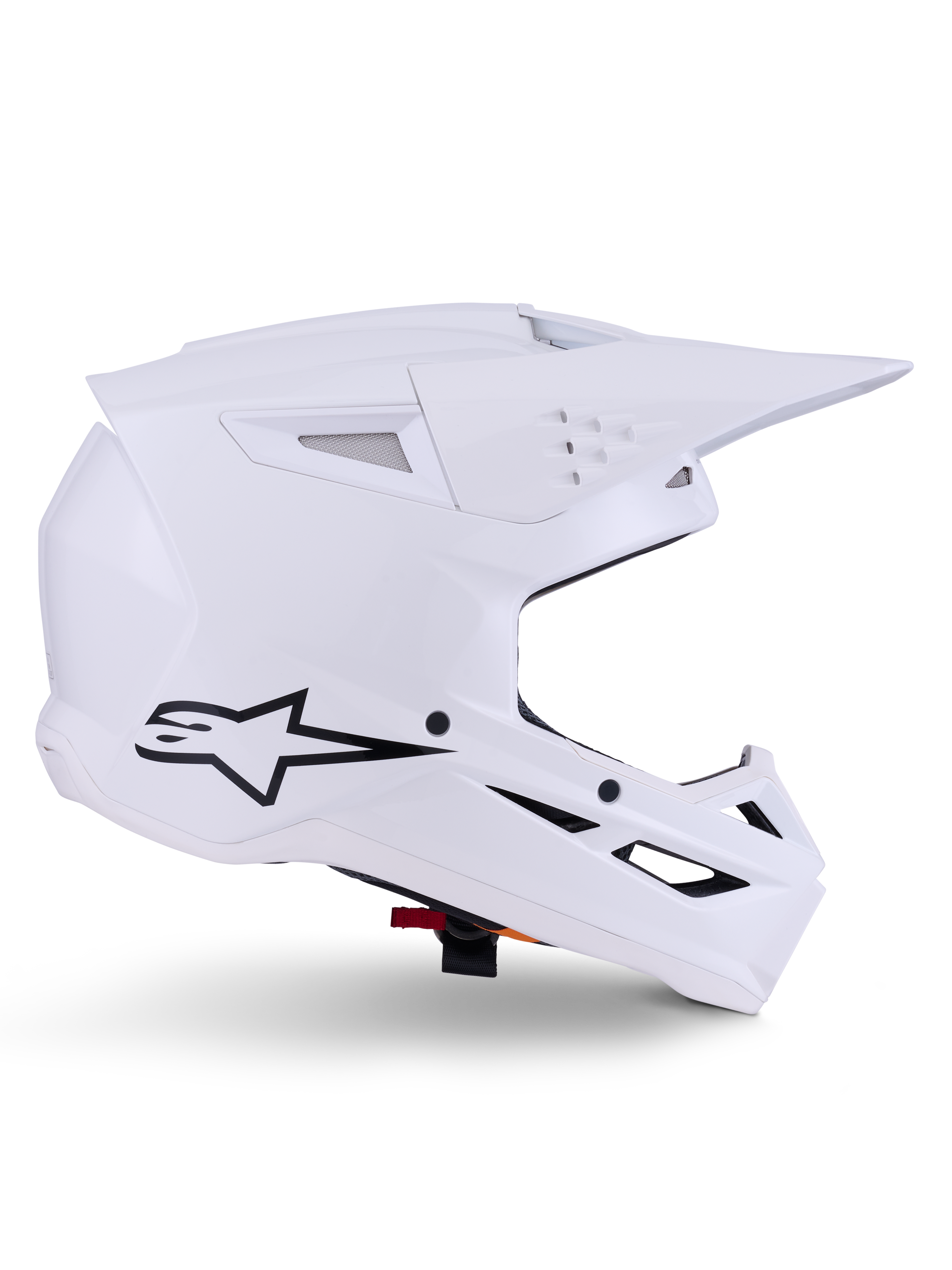 Alpinestars S-M3 Solid Helmet, capacete de motocross, branco brilhante, vista de perfil lateral com logótipo de estrela preto, calota aerodinâmica angular, múltiplas aberturas de ventilação, viseira e proteção de queixo integradas, proteção para corridas off-road