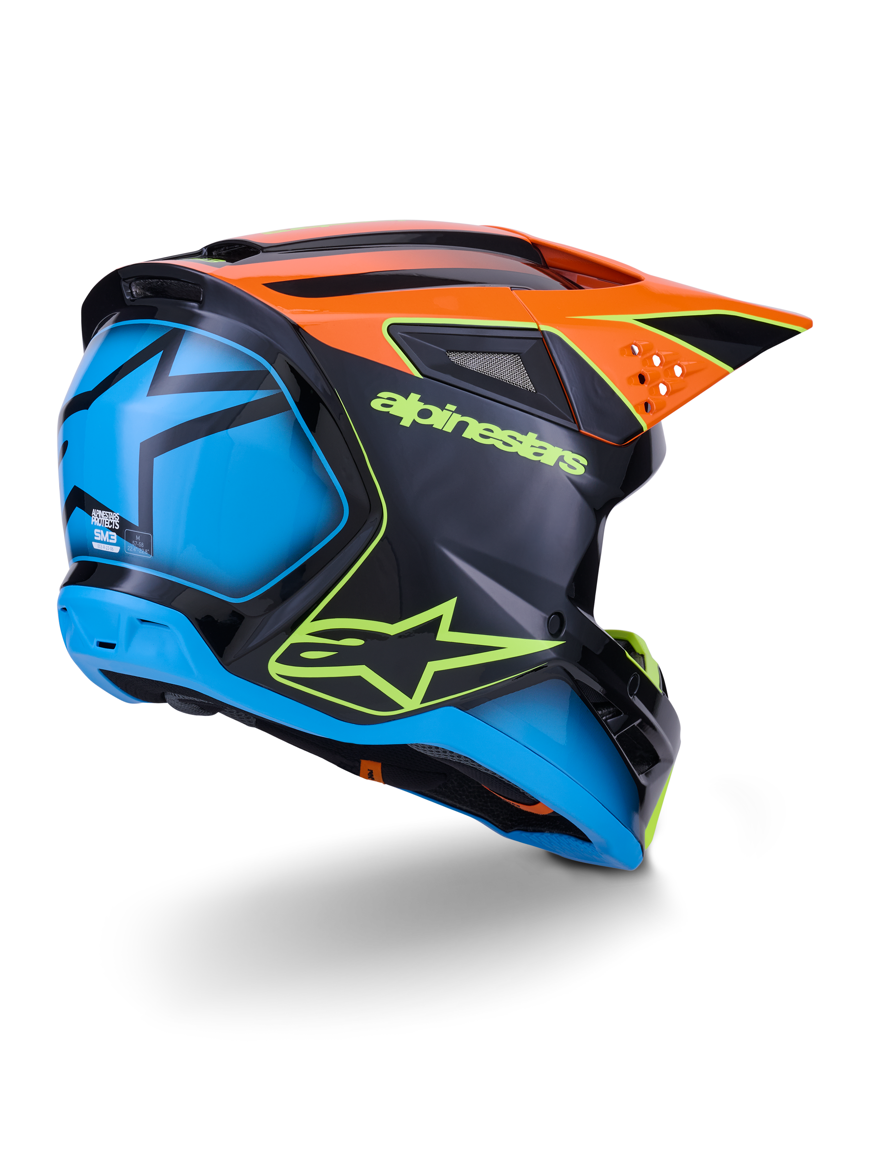 Alpinestars S-M3 Fray Helmet ECE 22.06, capacete de motocross, preto com painéis em laranja e azul, com logótipo Alpinestars em amarelo néon, secção traseira azul com gráfico de estrela, pala laranja com aberturas de ventilação integradas, equipamento de proteção profissional para todo-o-terreno