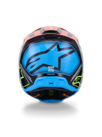 Capacete Alpinestars S-M3 Fray ECE 22.06, capacete de motocross, vista traseira, preto com detalhes vibrantes em laranja e amarelo néon, painel azul grande com o logótipo da estrela Alpinestars em preto, proteção para corridas todo-o-terreno