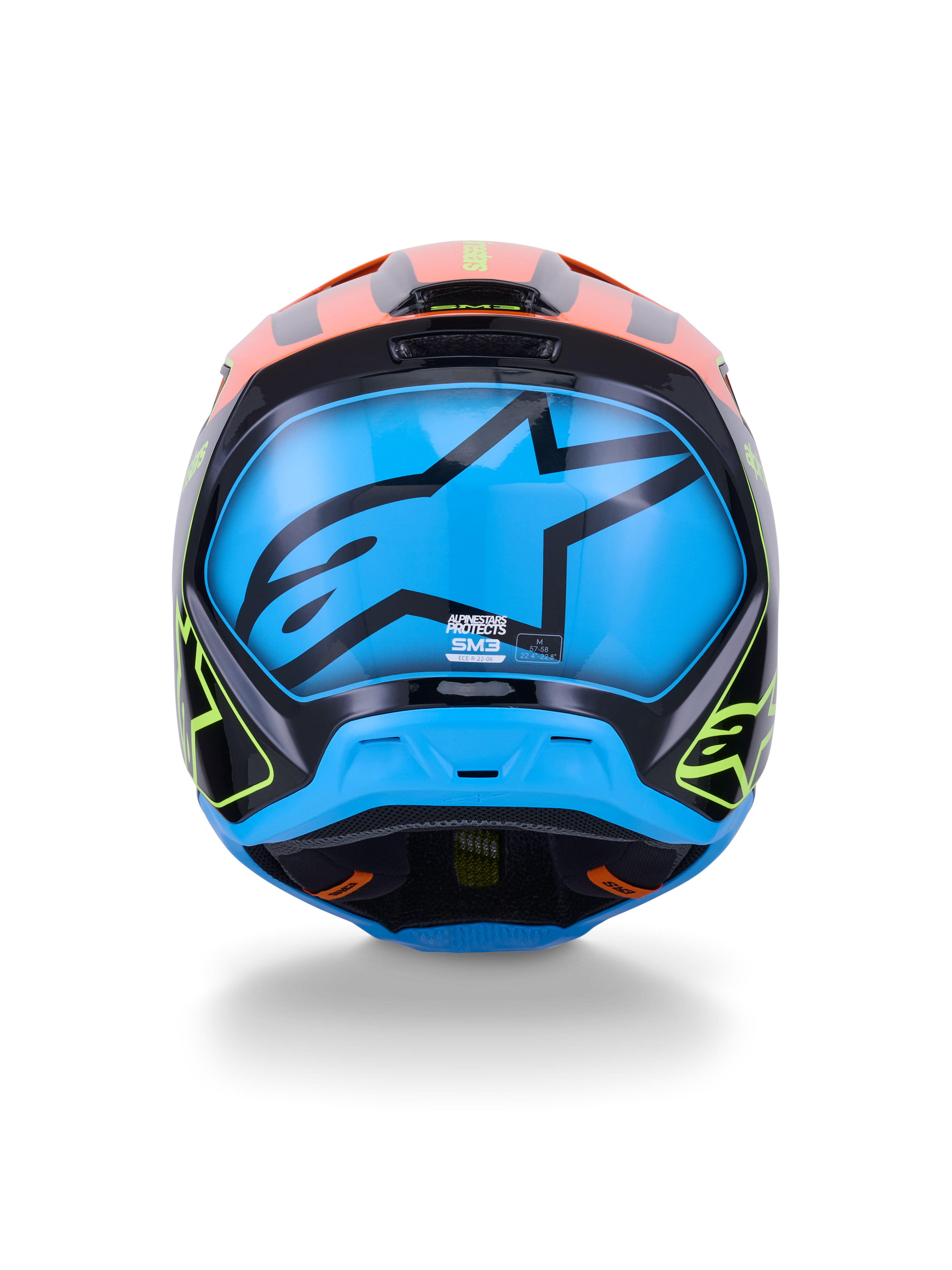 Capacete Alpinestars S-M3 Fray ECE 22.06, capacete de motocross, vista traseira, preto com detalhes vibrantes em laranja e amarelo néon, painel azul grande com o logótipo da estrela Alpinestars em preto, proteção para corridas todo-o-terreno