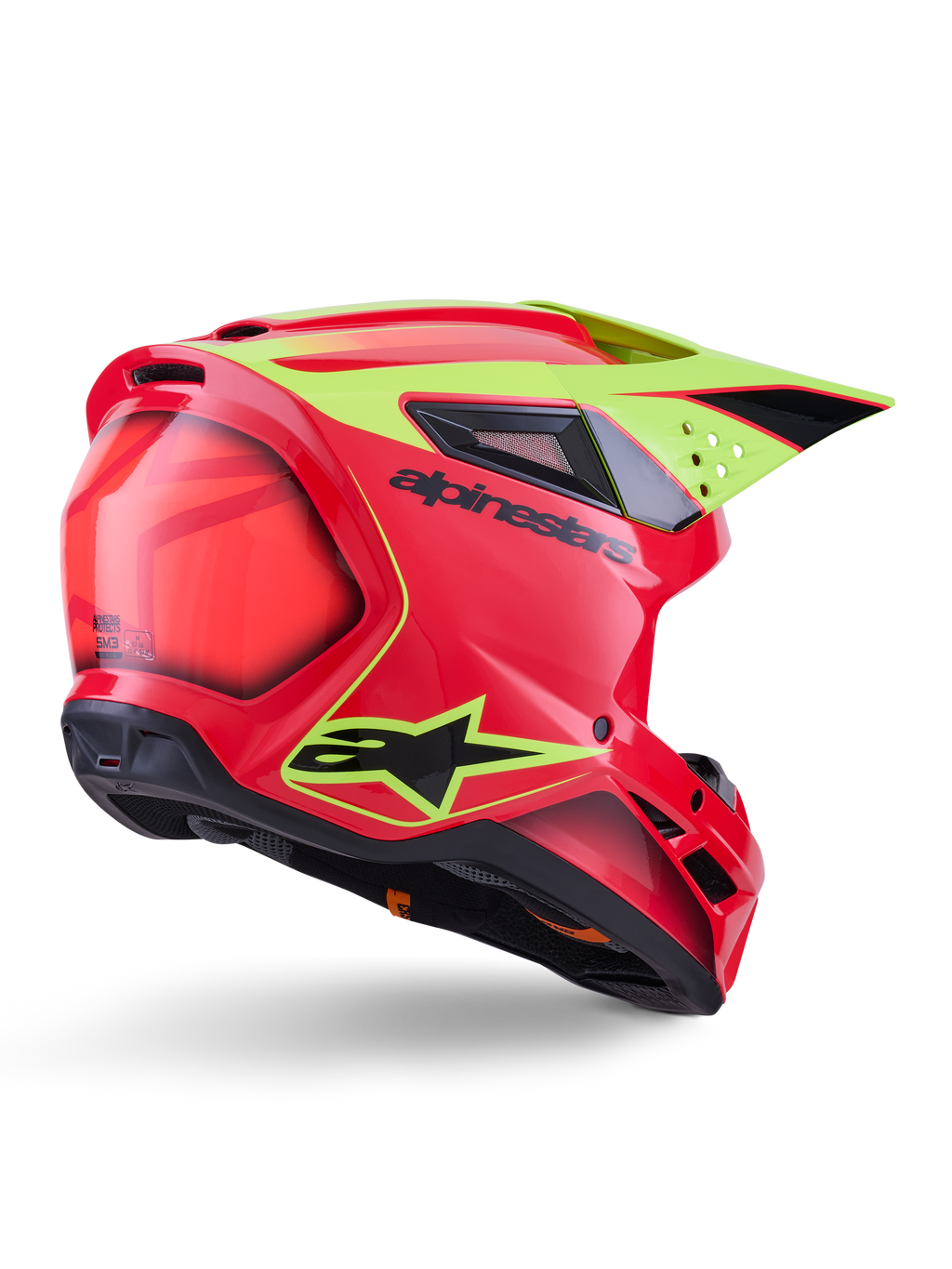 Alpinestars S-M3 Fray Helmet ECE 22.06, capacete de motocross, vermelho, amarelo néon e preto brilhante, vista traseira de três quartos mostrando a calote aerodinâmica com várias aberturas de ventilação, grafismos amarelo néon e logótipo Alpinestars em preto.
