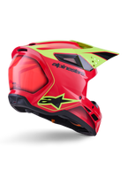 Alpinestars S-M3 Fray Helmet ECE 22.06, capacete de motocross, vermelho, amarelo néon e preto brilhante, vista traseira de três quartos mostrando a calote aerodinâmica com várias aberturas de ventilação, grafismos amarelo néon e logótipo Alpinestars em preto.