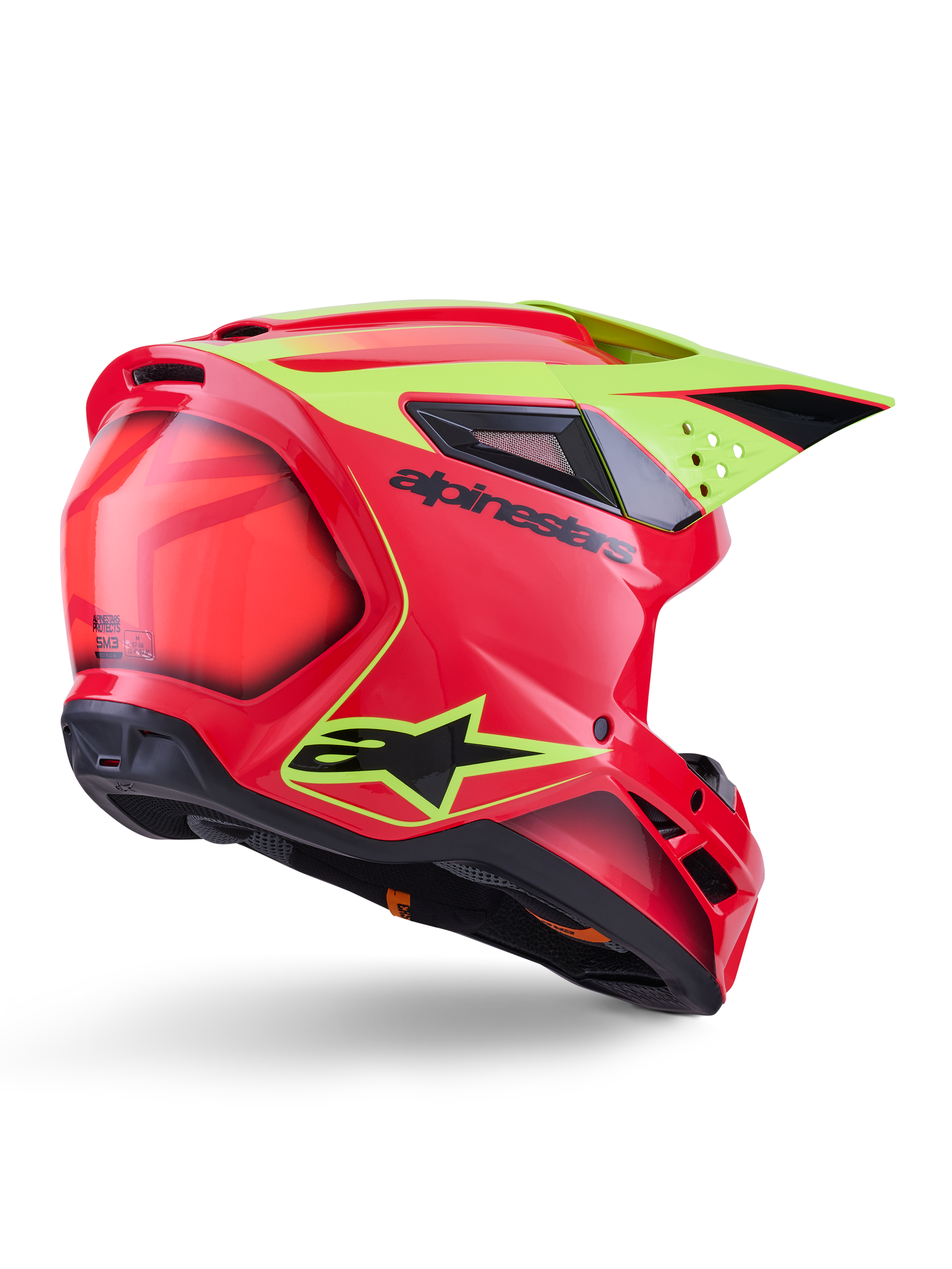 Alpinestars S-M3 Fray Helmet ECE 22.06, capacete de motocross, vermelho, amarelo néon e preto brilhante, vista traseira de três quartos mostrando a calote aerodinâmica com várias aberturas de ventilação, grafismos amarelo néon e logótipo Alpinestars em preto.