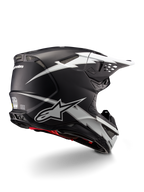 Alpinestars Supertech M10 Ampress Helmet, Motocross Helmet, Black and White Matte, featuring bold white lightning bolt graphics on a matte black shell, rear three-quarter view showing Alpinestars branding and ventilation ports